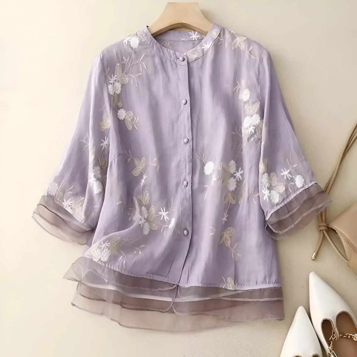 Tanzanix | Lös blus med broderade blommor