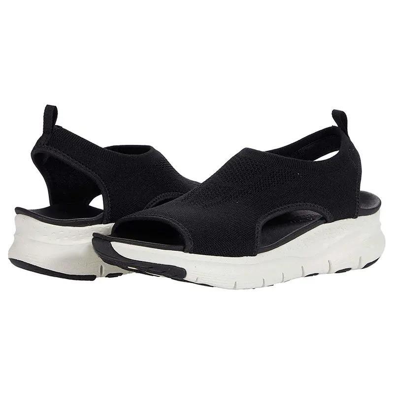 Orla | Slip-on-sandaler dam med kilklack i stickat material - Svart