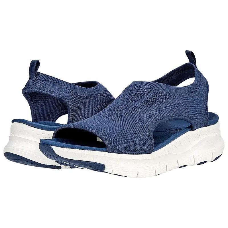 Orla | Slip-on-sandaler dam med kilklack i stickat material - Blå